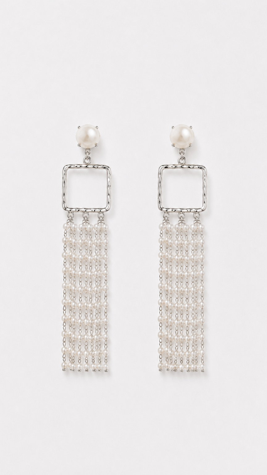 Baroque pearl and silver earring detail — SIENNA by Amélie George