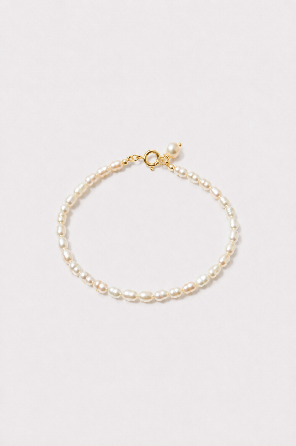 Delicate freshwater pearl wedding bracelet in gold