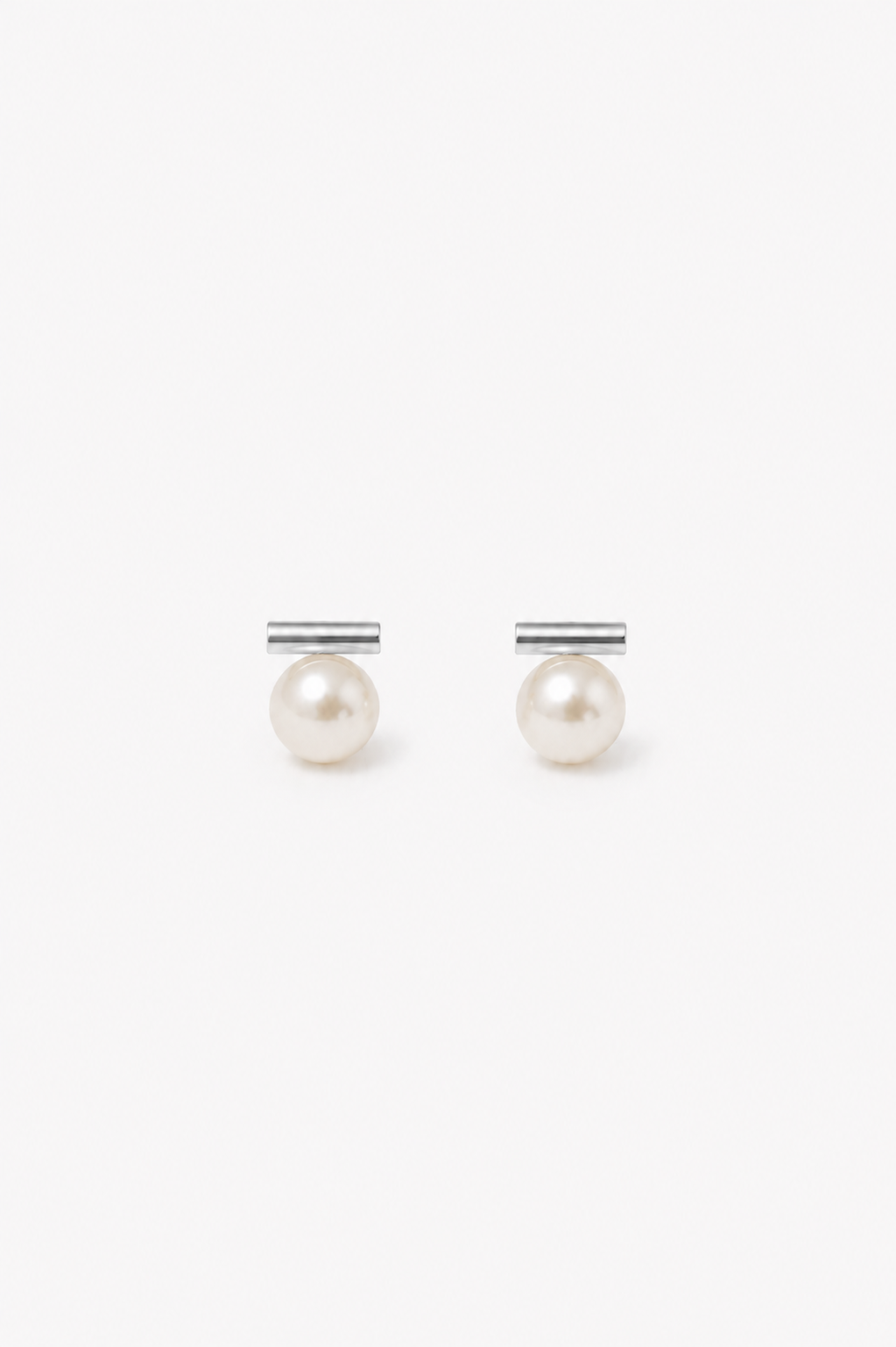 Pair of pearl earrings on a white background