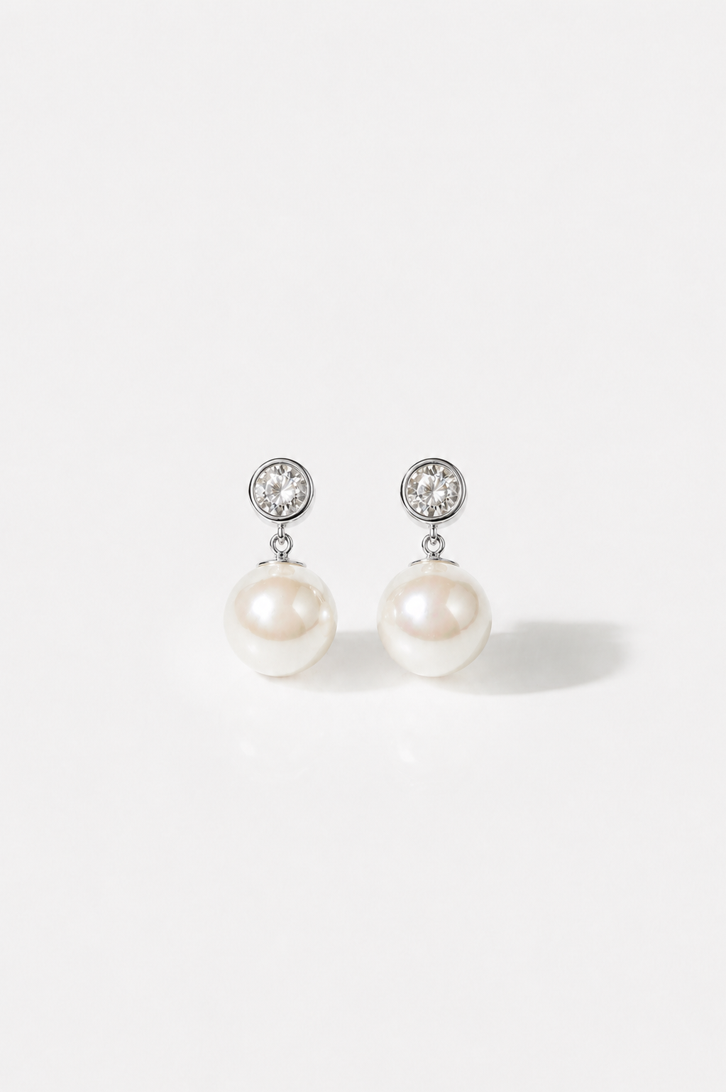 Pearl white gold wedding earrings with crystal details