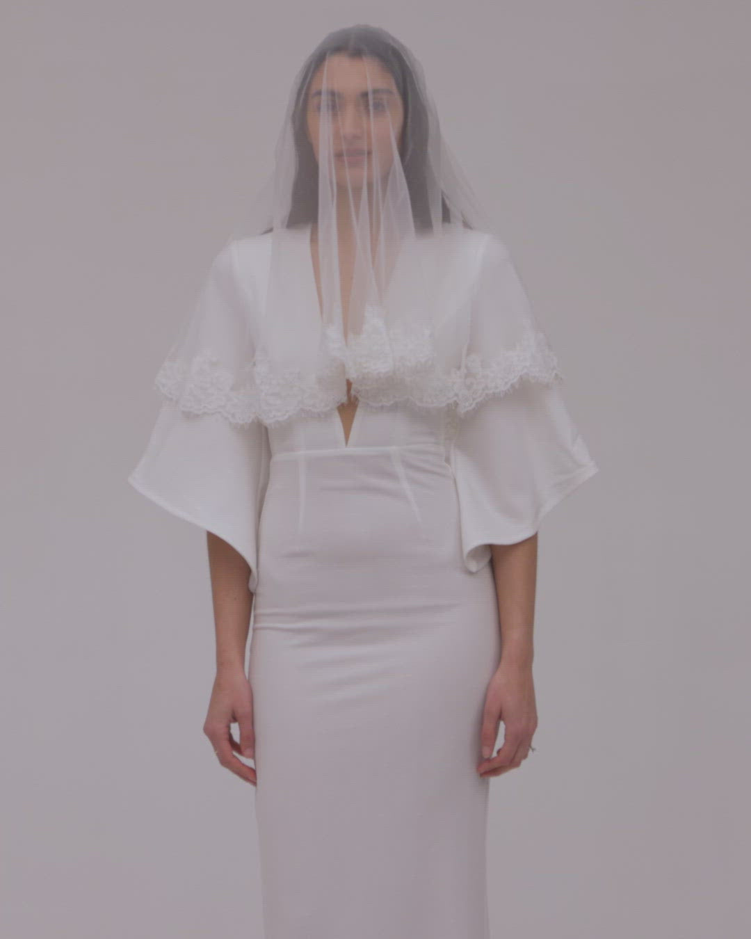Video of bride in two tier lace veil