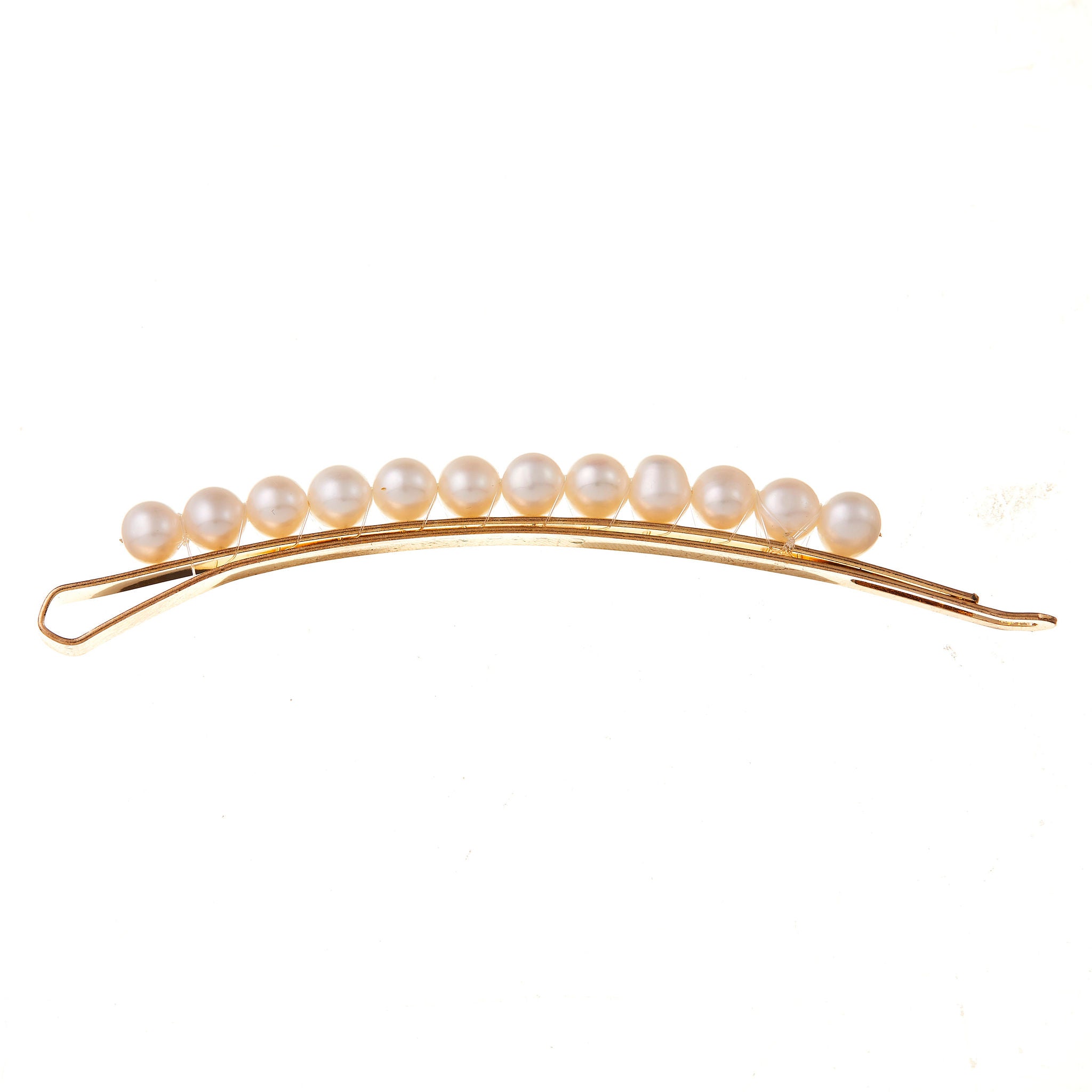 Luxurious wedding hair accessories in gold with pearls, designed to enhance any bridal hairstyle.