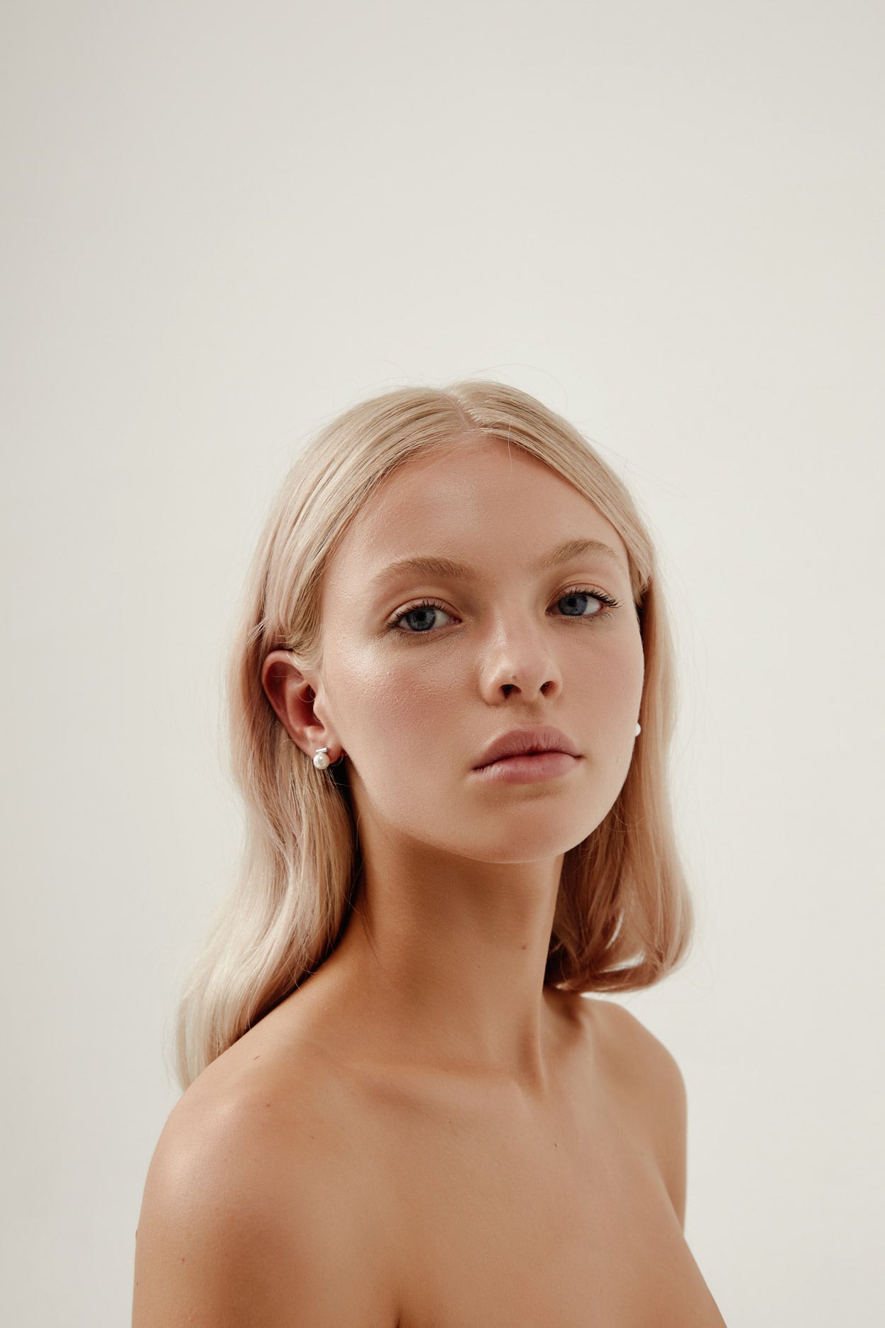 Sophisticated silver wedding earrings, designed for modern brides and bridesmaids.