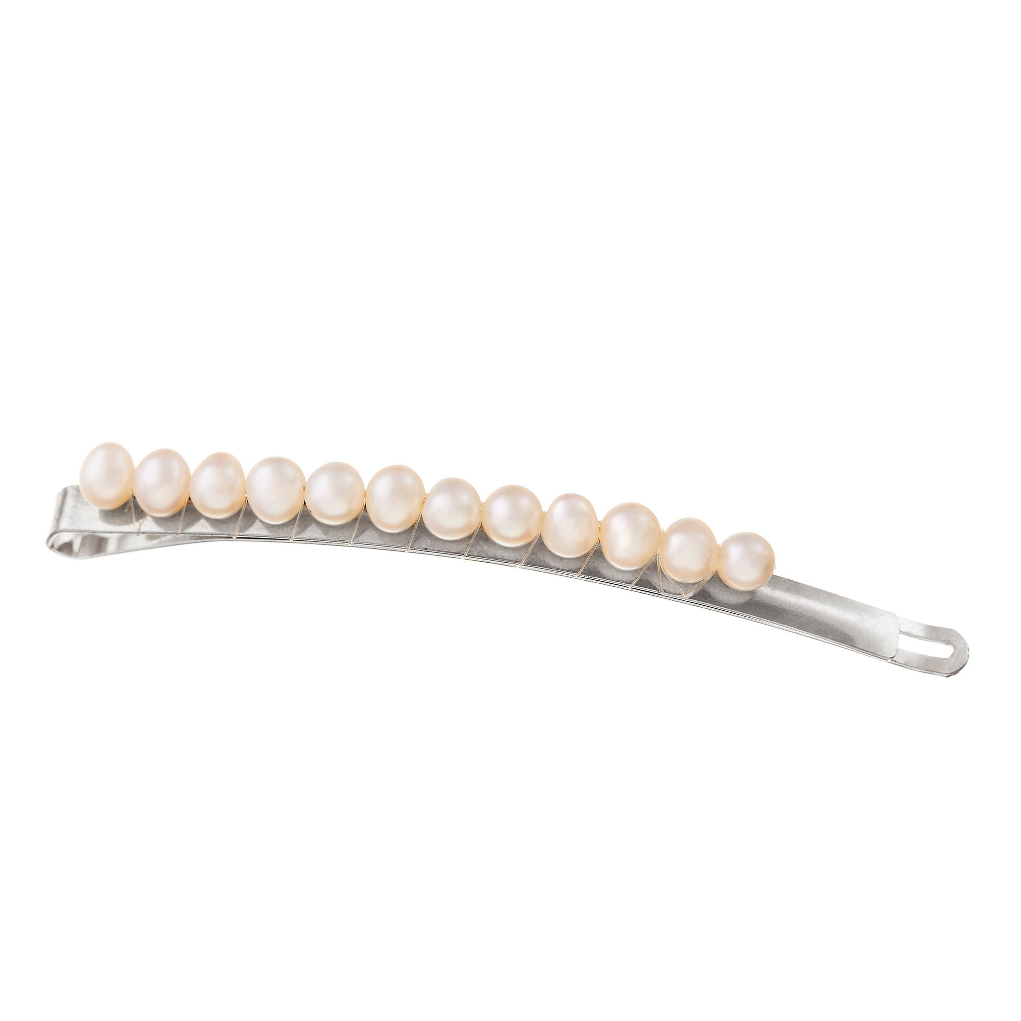 Beautiful bridal hair pieces in silver, adorned with pearls for a stylish bridal finish.