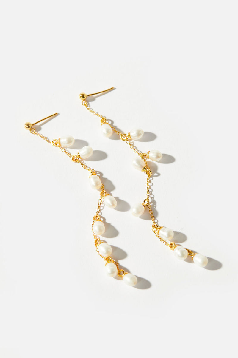 Elegant golden pearl cascade - Cassidy Freshwater Pearl Earrings in Gold
