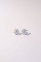 Shimmering crystal wedding studs for the modern bride or bridesmaid. White Gold / Silver detailing in a starburst formation.