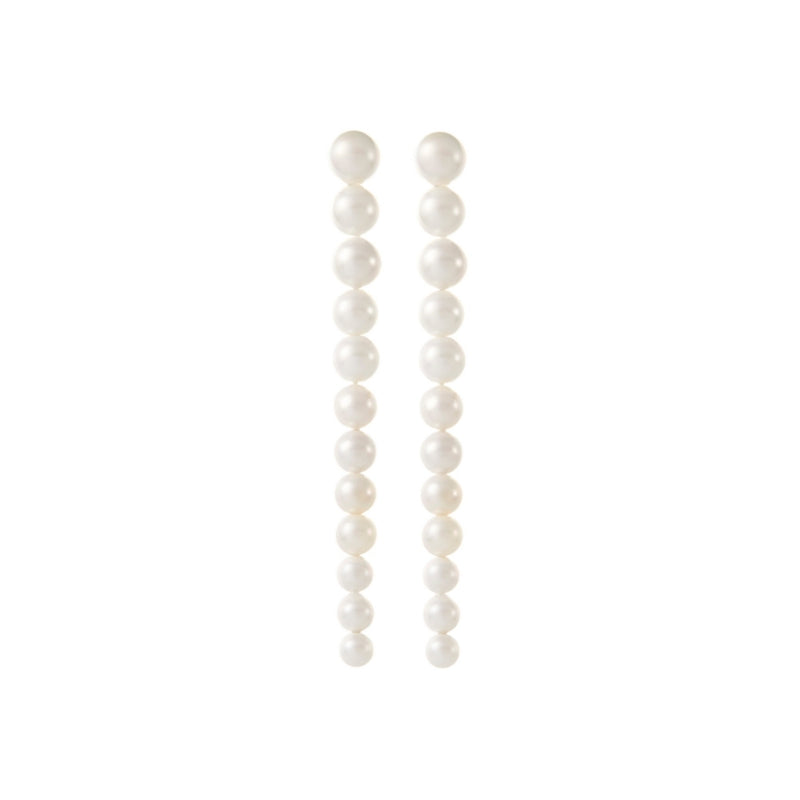 Long Gold Pearl Earrings for a modern Bride on a white background.