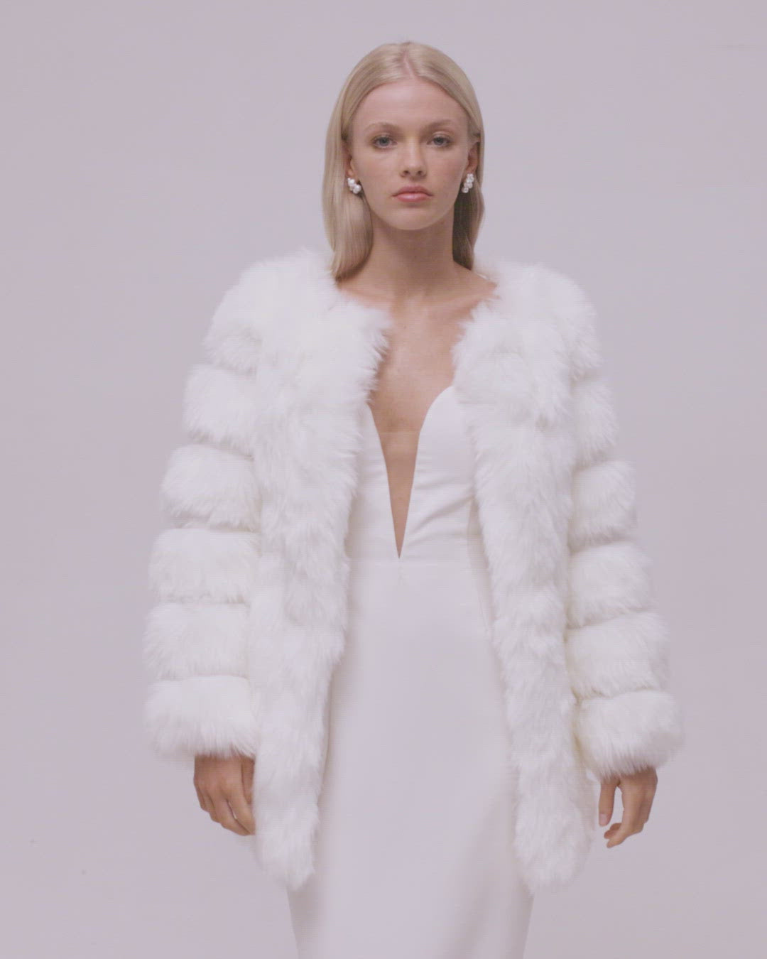 Video of Modern Fur Wedding Coat