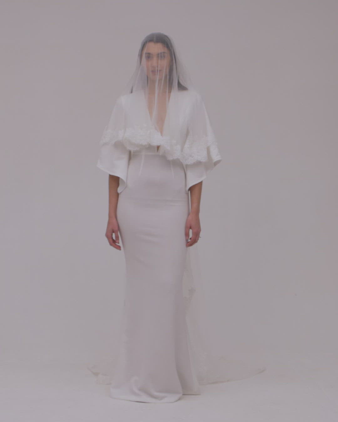 Video of bride in lace wedding veil
